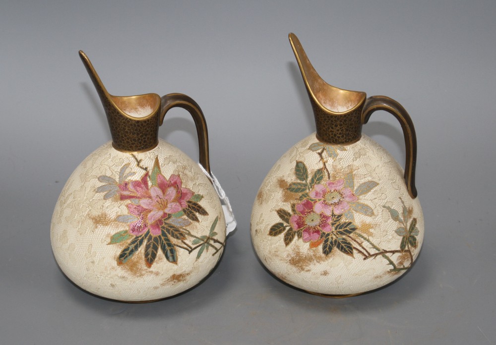 A pair of Doulton Burslem ewers, with floral decoration, US Patent stamp to base, height 17.5cm